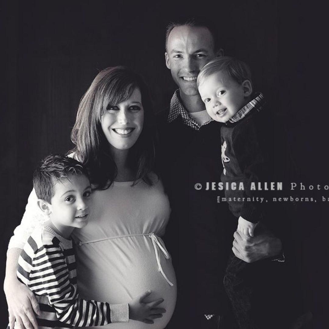 a family posing happily in a family portrait