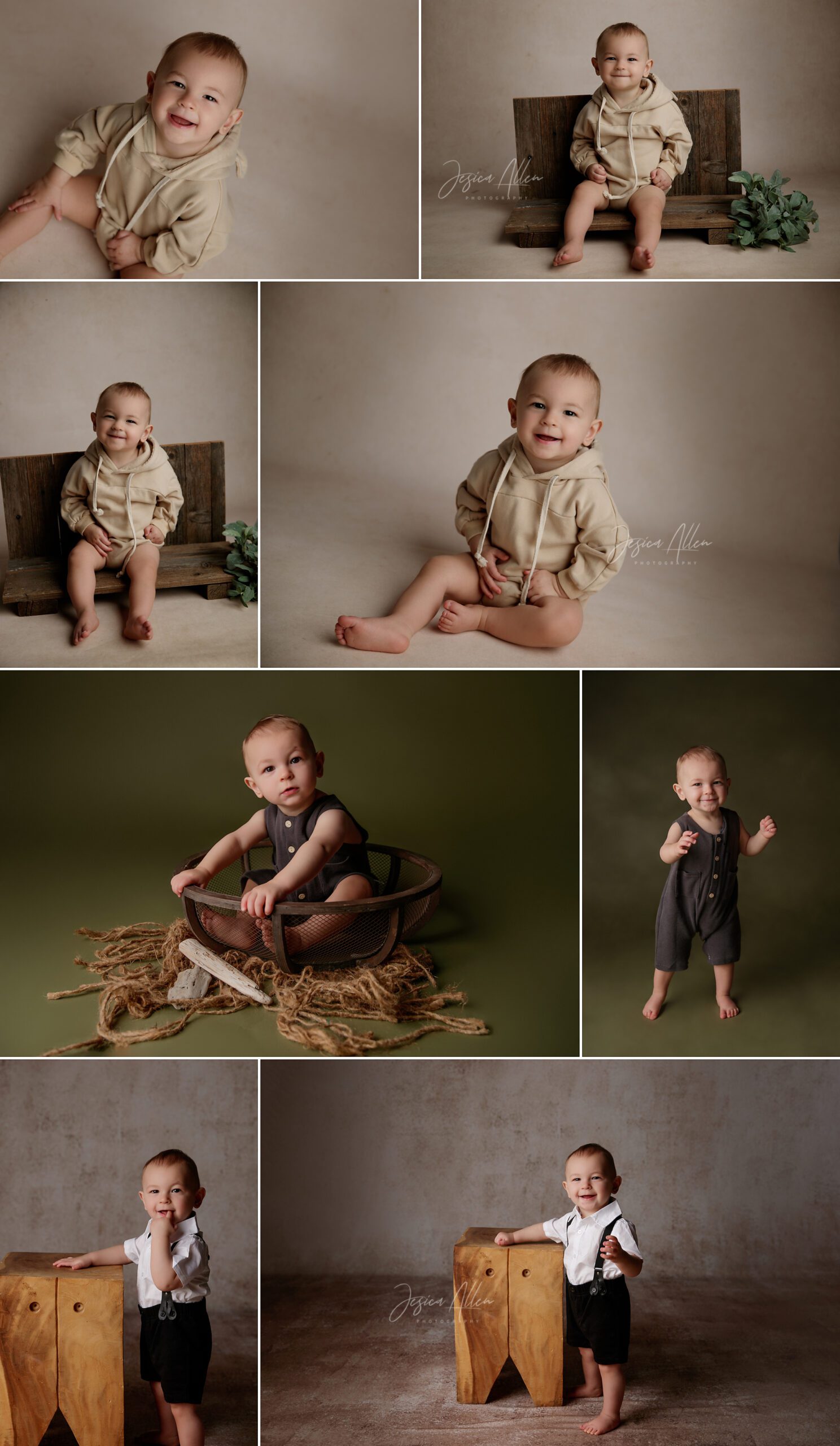 One-year-old boy wearing beige hoodie smiling during milestone session in a photography studio with a neutral background.
