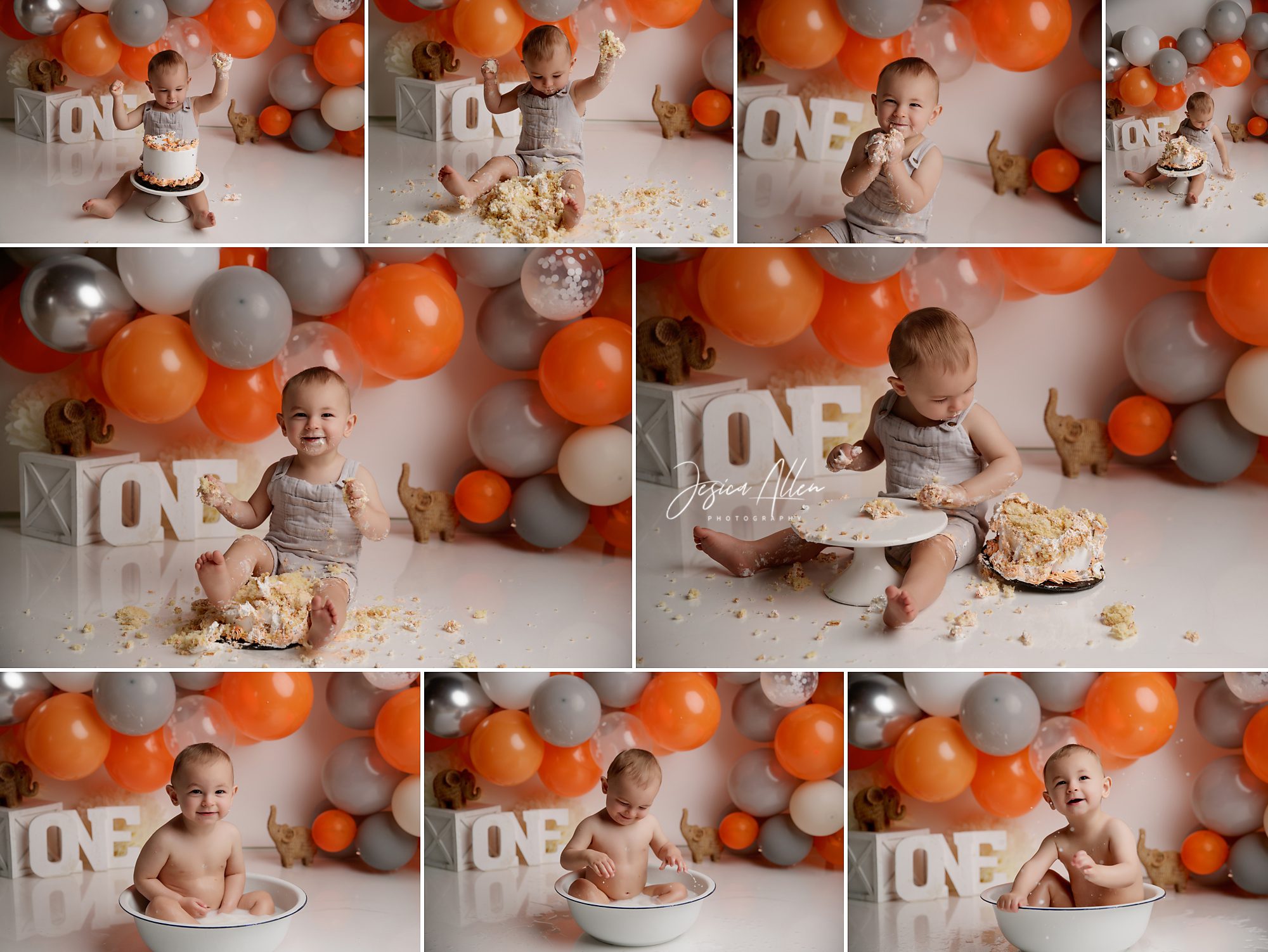 Baby boy celebrating his first birthday with a cake smash in front of orange and gray balloon decorations at Jesica Allen Photography studio.